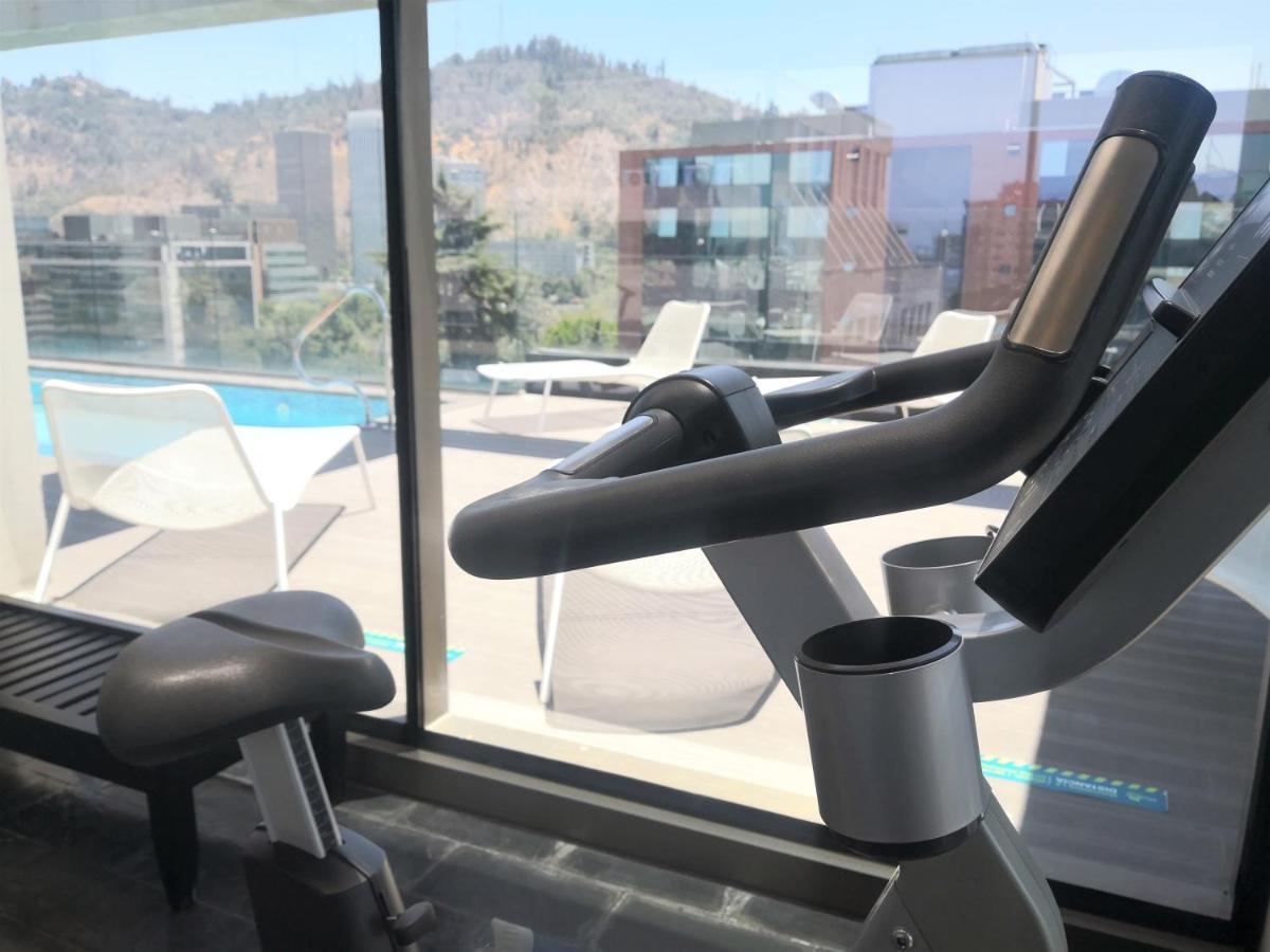 Solace Hotel Santiago Dış mekan fotoğraf A stationary bicycle with a water bottle holder